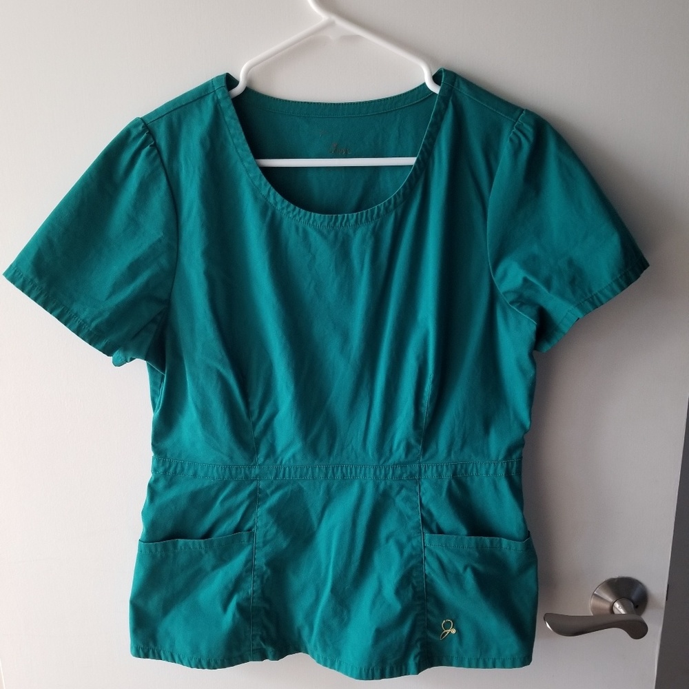 Jaanuu Peplum scrub top
